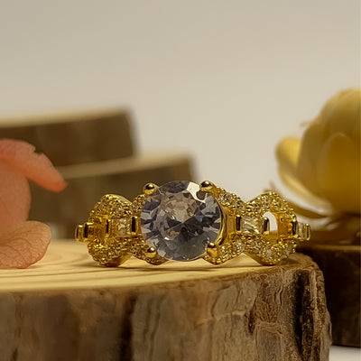 Golden Solitaire and Interlocking Pave Ring