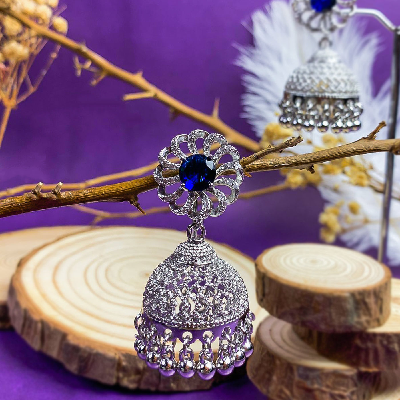 Silver-Toned Royal Blue Zircon Jhumka Earrings